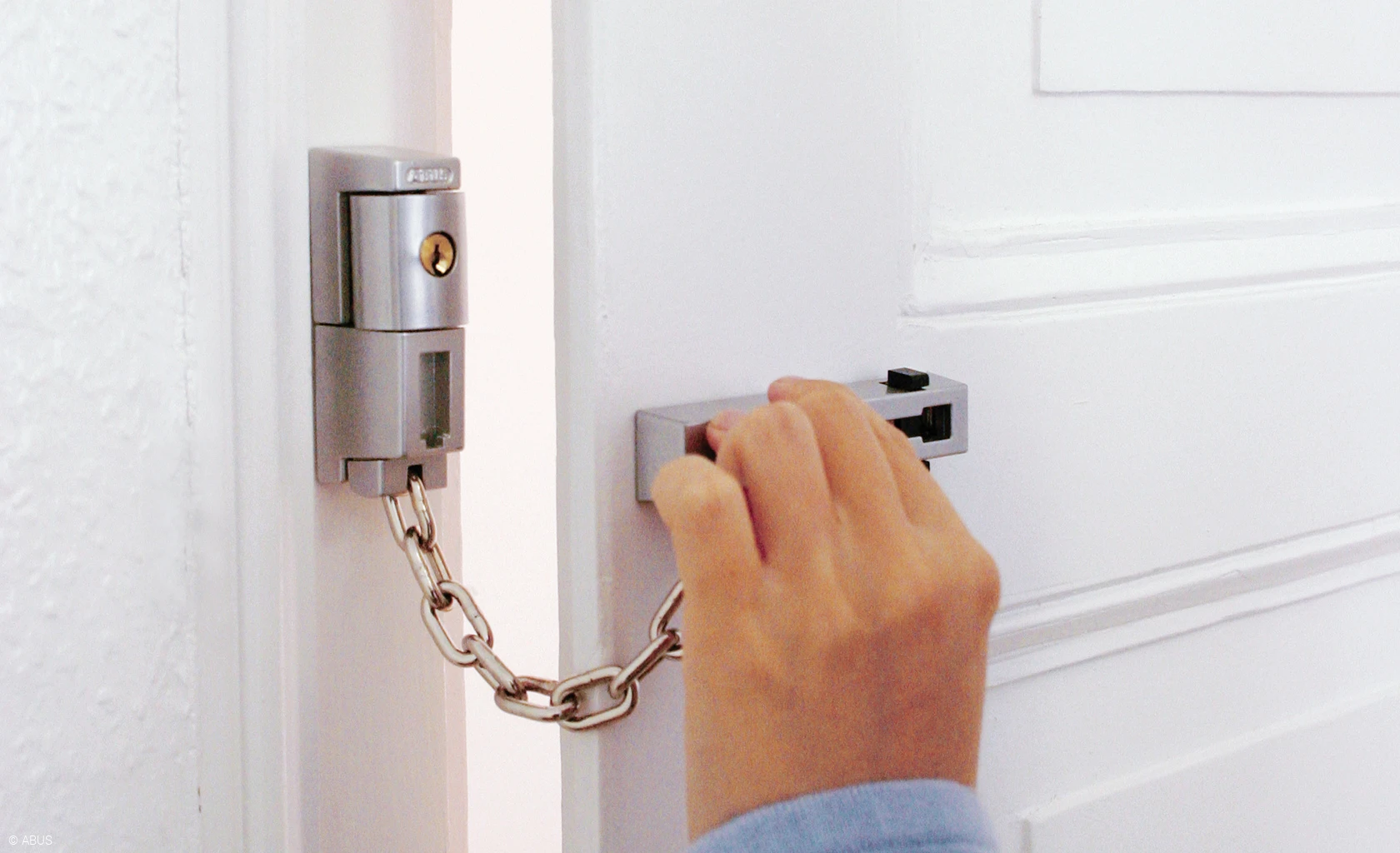 Protège-chaîne pour portes d'appartement et portes principales