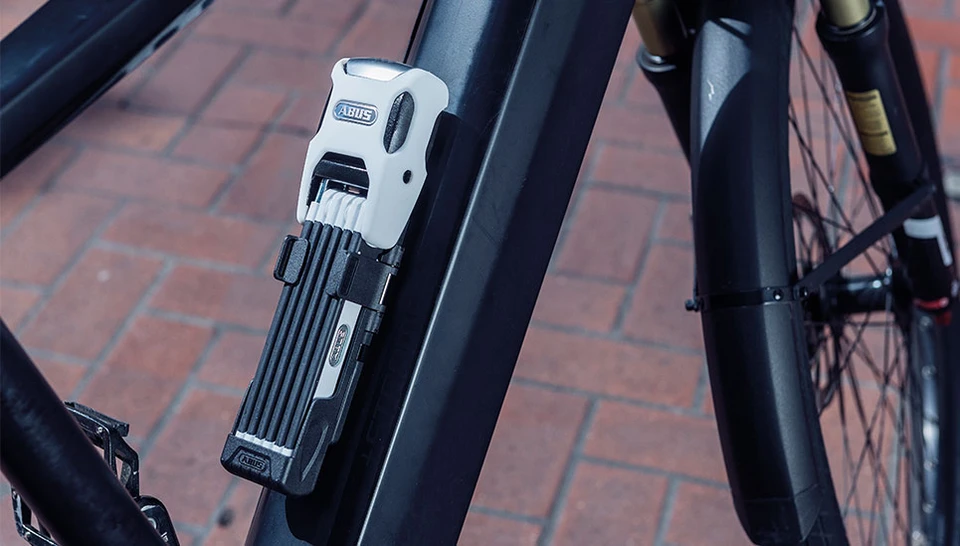 motor Forurenet Peep Låseholdere til cykellåse | Enkel & nem transport | ABUS